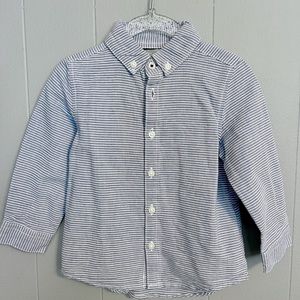 Seer sucker button down shirt. Blue background with white stripe.